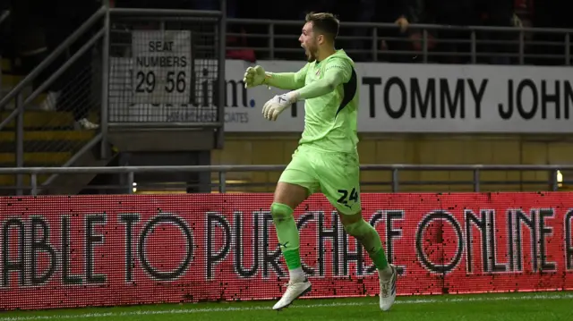 Leyton Orient goalkeeper Josh Keeley celebrates