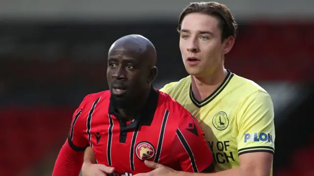 Walsall's Albert Adomah (left) and Charlton's Terry Taylor