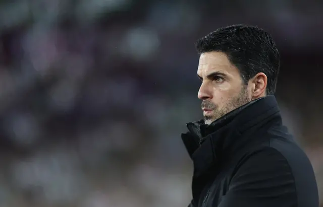 Arsenal manager Mikel Arteta looks on