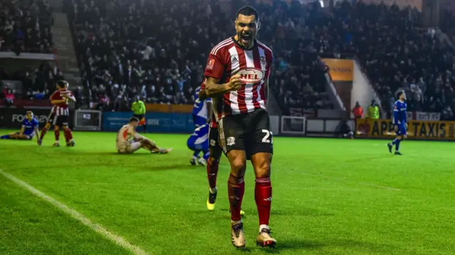 Exeter forward Josh Magennis celebrates