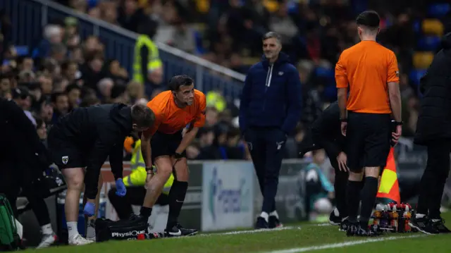 Referee Craig Hicks has treatment