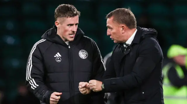 Celtic's Luke McCowan and Brendan Rodgers