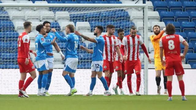 Stockport players celebrate after going 2-0 up against Brackley