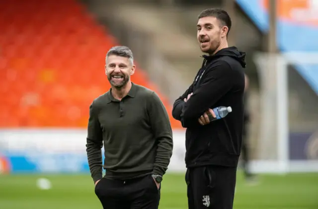 Former colleagues Stephen Robinson and Declan Gallagher share a joke pre-match