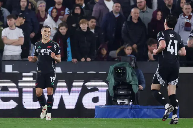 Arsenal's Leandro Trossard celebrates scoring their second goal.