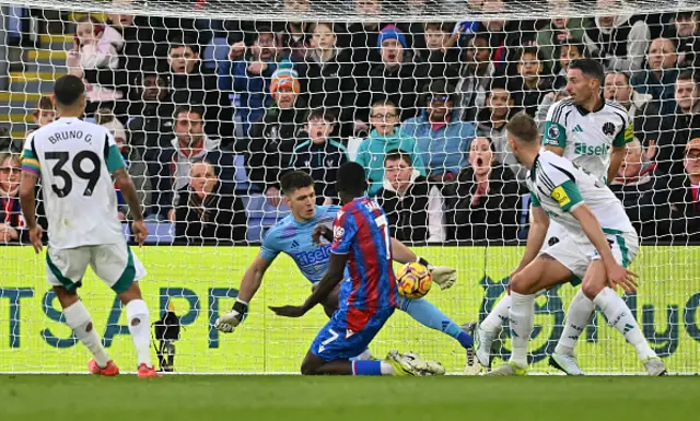 Nick Pope saves from Crystal Palace's Senegalese midfielder Ismaila Sarr