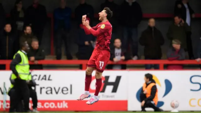 Jack Roles celebrates scoring for Crawley