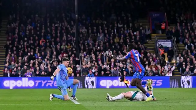 Nick Pope saves a shot from Crystal Palace's Ismaila Sarr.