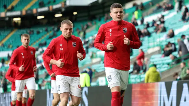 Ross County's Ronan Hale warms up