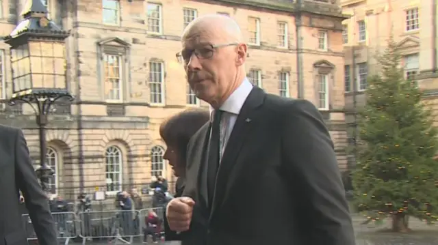 John Swinney arriving at Alex Salmond's funeral