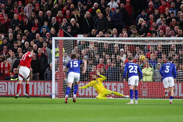 Chris Wood takes a penalty for Nottingham Forest