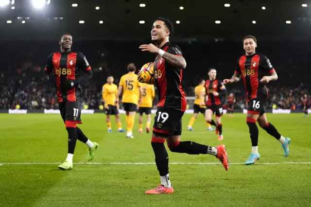 Bournemouth's Justin Kluivert (centre) celebrates scoring their side's fourth goal of the game.