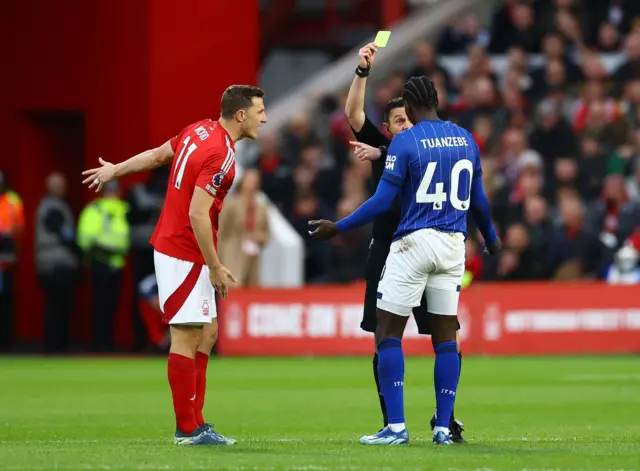 Aex Tuanzebe receives a yellow card.