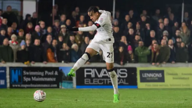 Jovon Makama scores Lincoln's third goal at Chesham