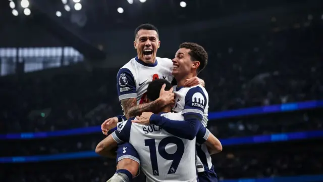 Spurs players celebrate