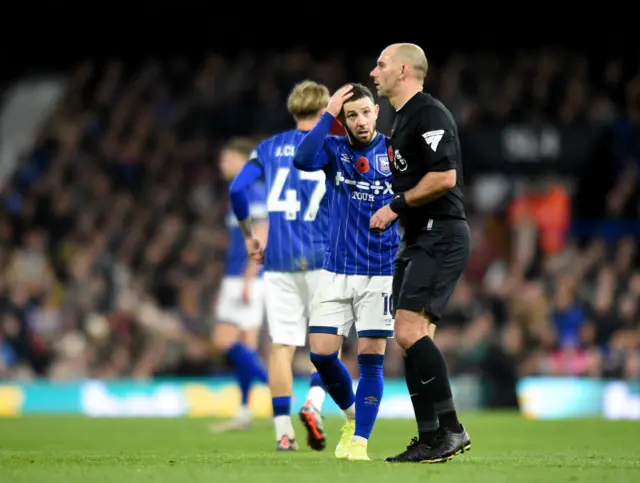 Ipswich Town's Conor Chaplin looks stunned at referee Tim Robinson