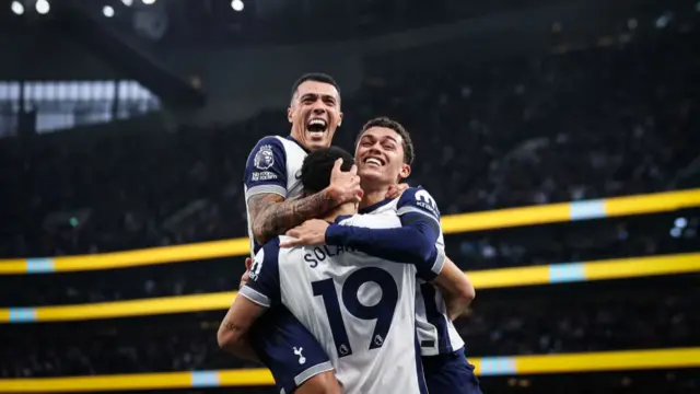 Dominic Solanke of Tottenham Hotspur celebrates with teamates Pedro Porro and Brennan Johnson