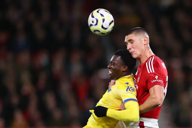 Nottingham Forest defender Nikola Milenkovic heading the ball