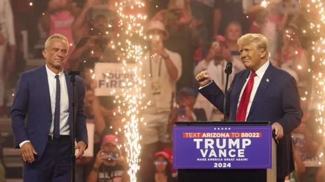 Robert F. Kennedy Jr. joins Donald Trump at an election rally at the Desert Diamond Arena in Glendale, Arizona, USA, 23 August 2024. The US presidential election takes place on 05 November 2024. Kennedy announced earlier today that he is ending his campaign for the presidency and endorsing Republican presidential nominee Donald Trump. Republican Presidential Nominee Donald J. Trump and Turning Point Action Rally, Glendale, USA