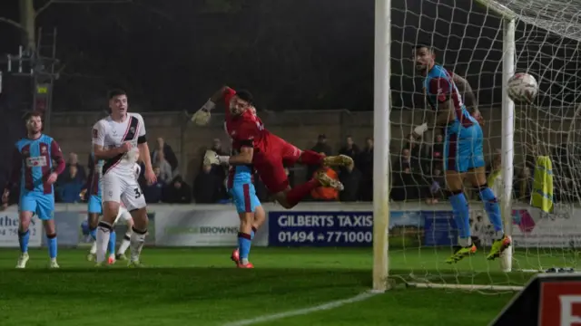 Jack Moylan's strike sails into the corner of the Chesham net