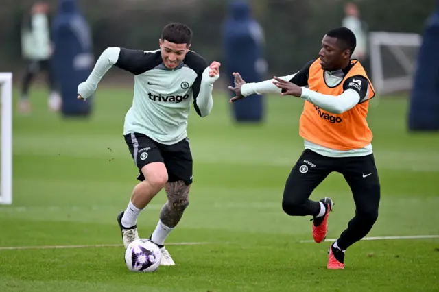 Enzo Fernandez and Moises Caicedo of Chelsea during a training session at Chelsea Training Ground