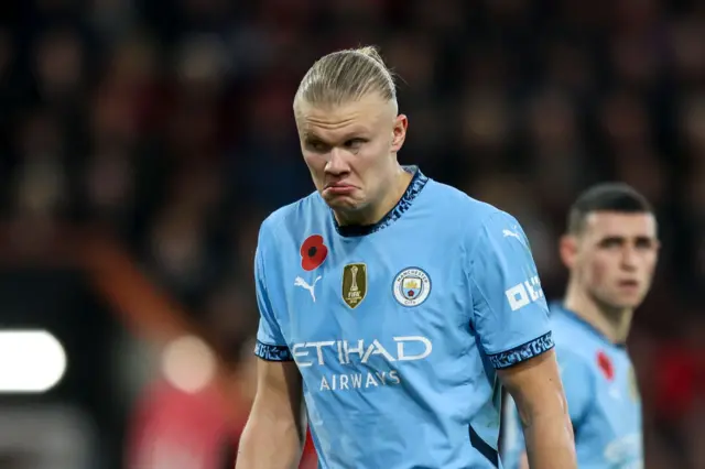 Erling Haaland in a Manchester City shirt