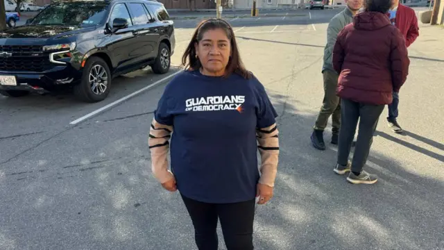 A voter in Allentown, Pennsylvania stands in the street