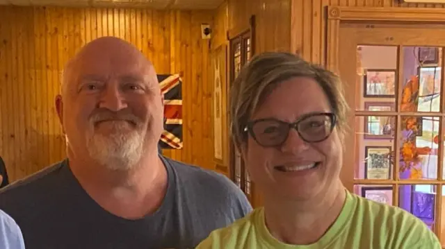 Headshot of Roger and Laura smiling