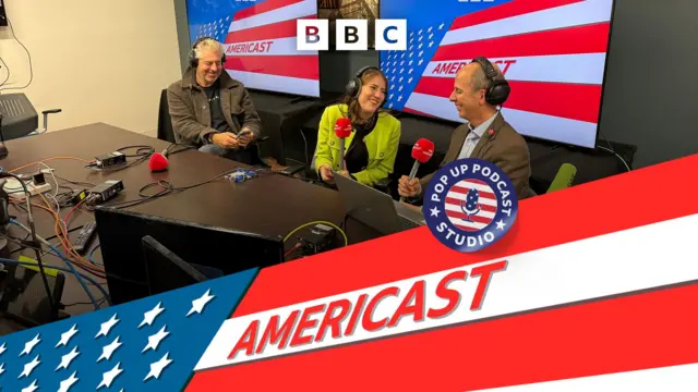 Americast banner in front of picture of presenters speaking into microphones