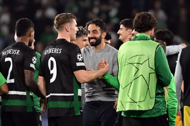 Amorim chats to his players at full time