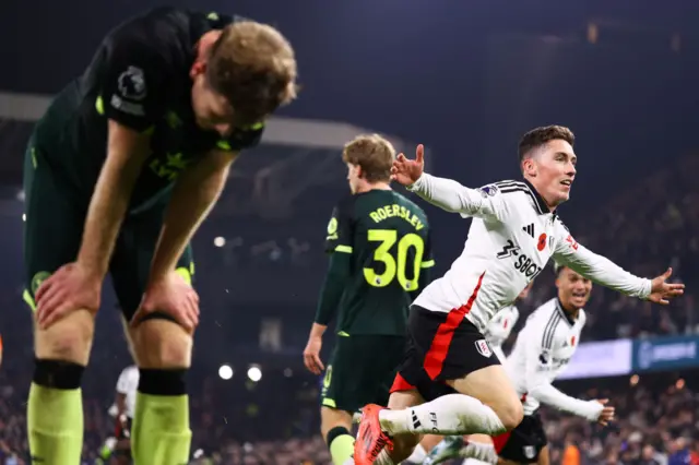 A Brentford player hangs his head as Harvey Wilson celebrates