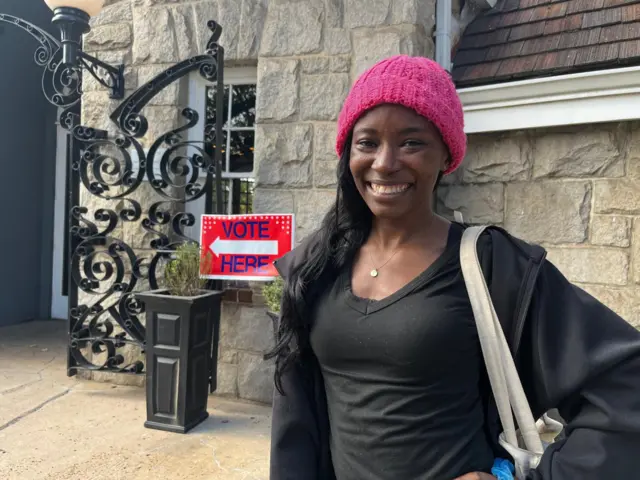 Teerica Doward smiling outside polling station