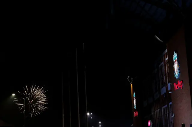 Fireworks in the distant sky next to the kop