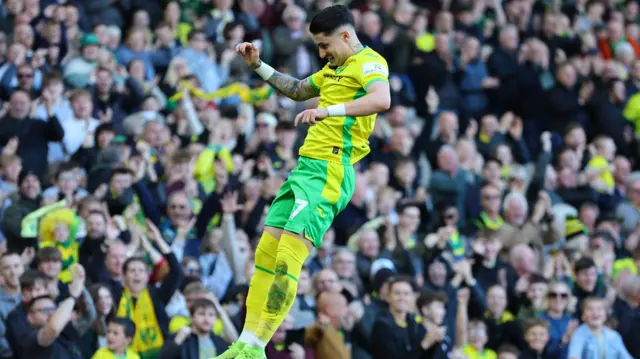 Borja Sainz leaps into the air in front of the Norwich fans after scoring against Middlesbrough in October