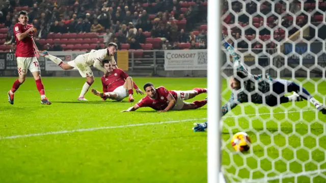 Sheffield United's Harrison Burrows watches his shot nestle in the far corner