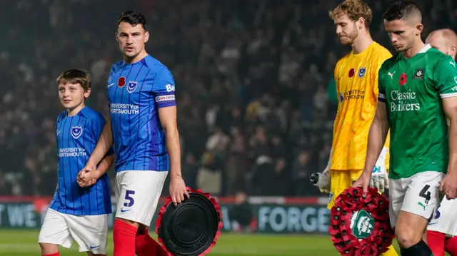 Portsmouth captain Regan Poole before their Championship encounter at Plymouth