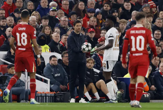 Alonso hands a ball to Boniface