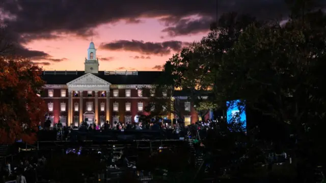 Members of the media report from Howard University ahead of an election night event