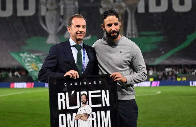 Amorim is presented with a gift marking his time at the club