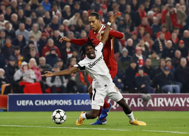 Frimpong goes down under the challenge of Van Dijk