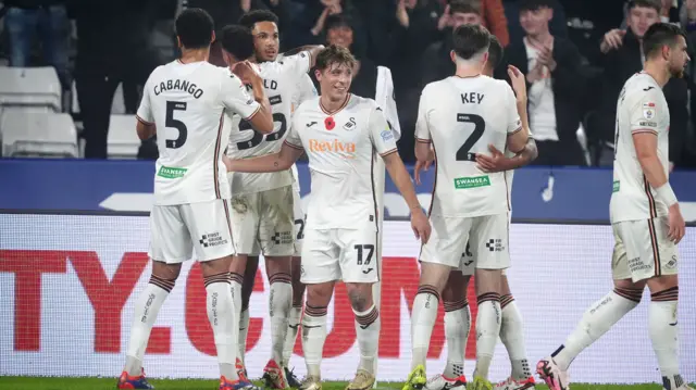 Swansea players celebrate Myles Peart-Harris' opener against Watford