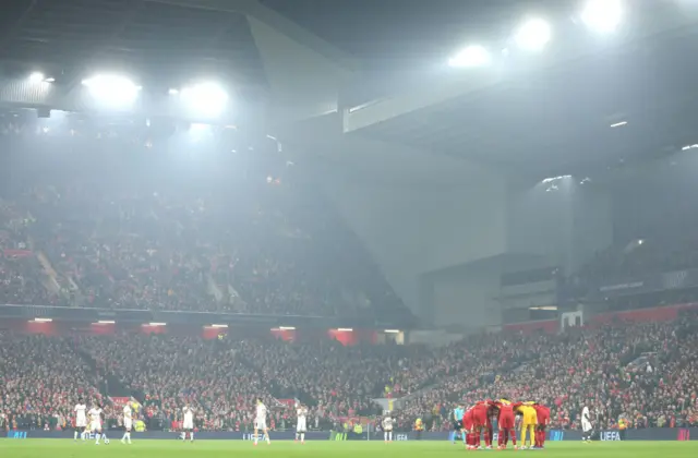 Pre kick off huddles at Anfield