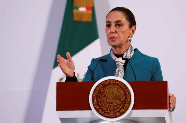 Claudia Sheinbaum talking at a podium