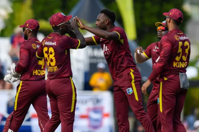 Matthew Forde of West Indies celebrates the dismissal of Will Jacks