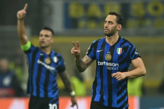 Hakan Calhanoglu celebrates