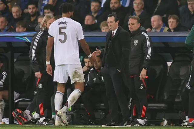 Unai Emery manger / head coach of Aston Villa shakes hands with Tyrone Mings