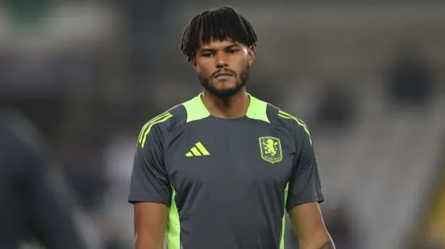 Tyrone Mings of Aston Villa warms up