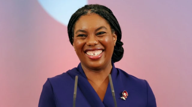 Kemi Badenoch grins after winning the Tory leadership contest