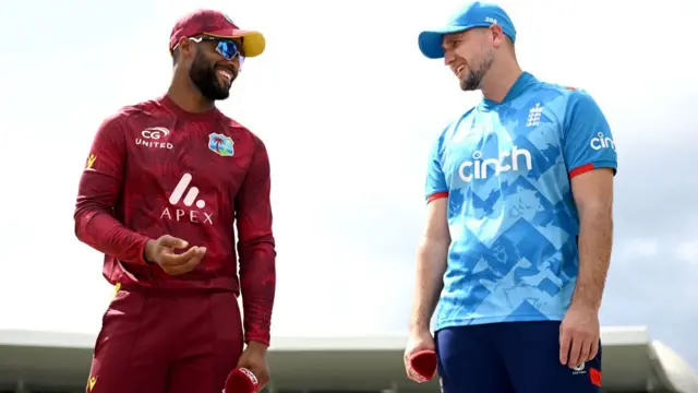 West Indies captain Shai Hope speaks with England captain Liam Livingstone