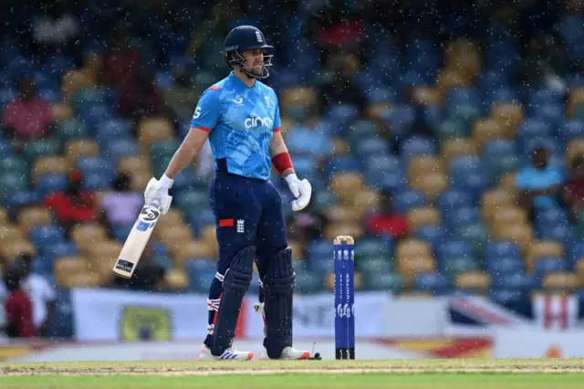 England captain Liam Livingstone stands at the crease during a rain shower